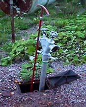 Photo of Standpipe and Wrench Inserted into the Hydrant